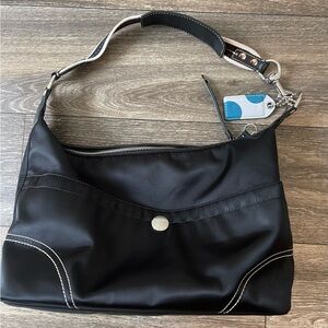 Coach Black vintage nylon bag with white stitching and silver hardware.